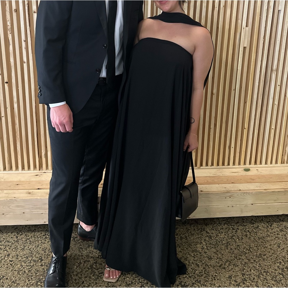 Women’s black dress with scarf attached